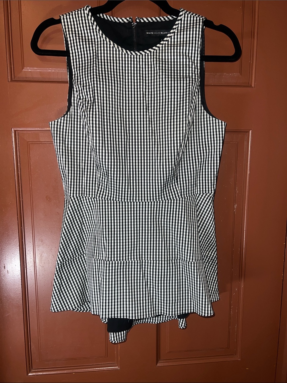 Black and white gingham top with flared peplum hem